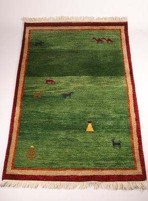 Middle Eastern Gabbeh Wool Carpet, Green with Figures and Animals. Measuring approximately 4 