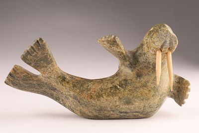 Inuit Soapstone Walrus Carving, Signed in Roman Letters, 7 Inches. Hand-carved walrus sculpture 