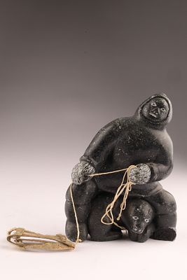 Andrew Valik Inuit Soapstone Hunter with Bear and Sled Signed Sculpture, 5 Inches. Carved black 
