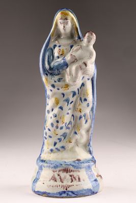 19th-C Polychrome Faience Statuette of the Madonna and Child, France. 
It is crafted from 