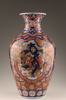 Antique Japanese Imari Porcelain Vase. An antique Japanese Imari porcelain vase in traditional 