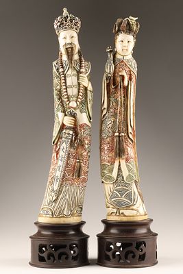 Pair of Chinese School Carved Polychrome Emperor and Empress Figures. A Pair of Chinese Emperor 