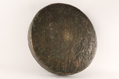 A Large Antique Heavy Chinese Hand Hammered Bronze Gong with traces of red paint on 