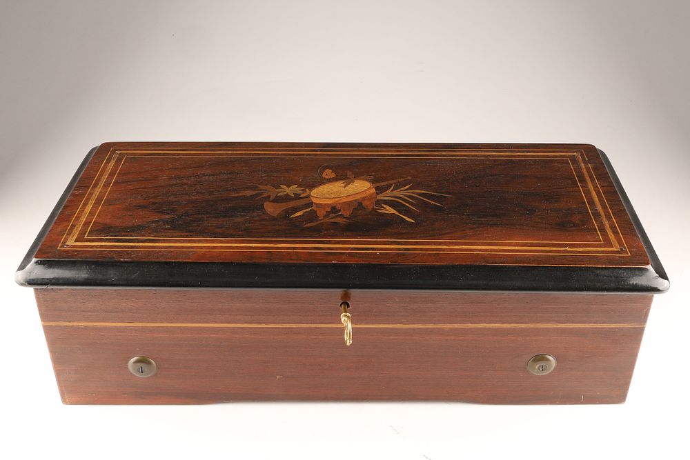 Antique Swiss Cylinder Roll Music Box in Marquetry Box. An antique Swiss cylinder music box 
