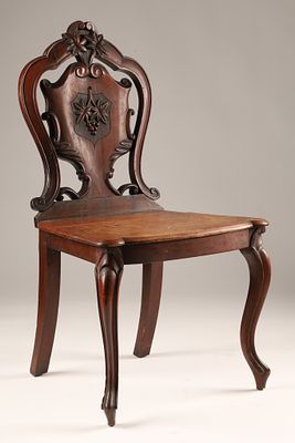 Antique Victorian Mahogany Hall Chair with Cartouche Backrest. An antique Early Victorian 