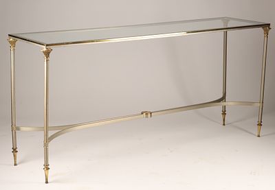 Hollywood Regency 1960s French Long Console Table / Att. Maison Jansen featuring a brushed 