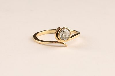 14K Yellow Gold Diamond Solitaire Ring, Size 9.5. 14K stamped 585, bezel set with 3.2 grams. 