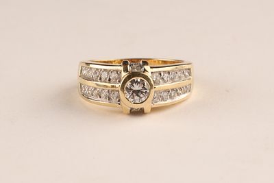 14K Yellow Gold Ring With Bezel-set Diamond and Channel-set Accent Diamonds, Size 9. 14K yellow 