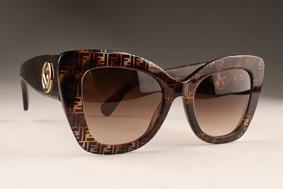 Pair of Fendi F is Fendi Cat Eye Sunglasses. Pair of Fendi F is Fendi Cat-Eye Sunglasses (Style 