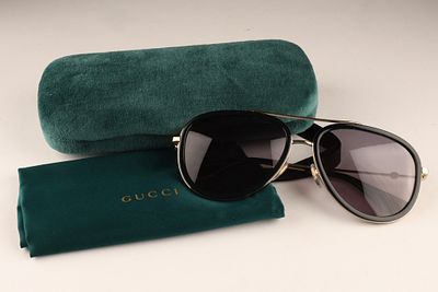Pair of Gucci Aviator Sunglasses with GG logo and velvet case. Pair of Gucci GG0062S Aviator 