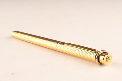 Cartier Vendome Gold Plated Ball Point Pen with Trinity Ring Detail, slender, gold-plated body 