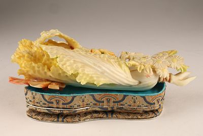 Chinese Carved Figural Cabbage Leaf with Cricket. A Chinese carving of a cabbage, featuring 