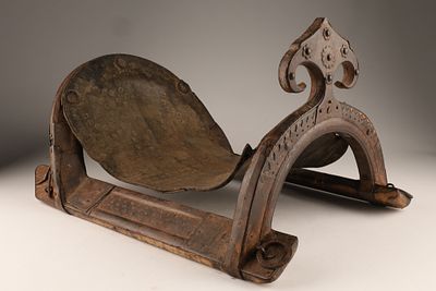 Antique Middle Eastern Wooden and Metal Camel Saddle Frame. An antique Middle Eastern camel 