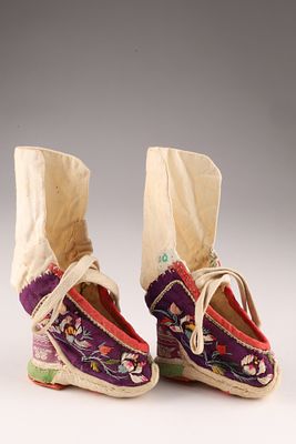 Pair of Chinese Purple Satin Embroidered High Heeled Lotus Shoes. THE SIMON CHANG COLLECTION - A 