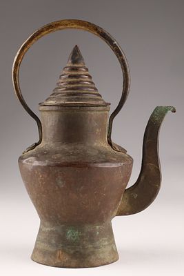 Antique Middle Eastern Hand Hammered Copper Ewer or Pitcher. An antique Middle Eastern Ottoman 