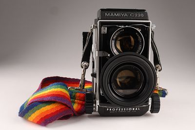 Vintage Mamiya C220 Professional Medium Format TLR Camera with Rainbow Strap. A classic Mamiya 