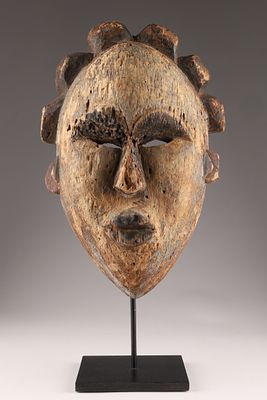 Antique African Wood Carved Tribal Punu Pounou Gabon Mask with oval face contour, scalloped 