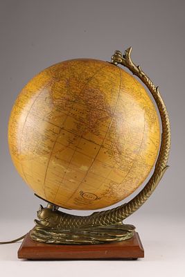American Cram's Illuminated Terrestrial Table Globe with Dolphin Base . A vintage American 