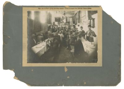 Photograph of the Sukkah of "Beth Tavshil HaKlali" (Public Kitchen) in Jerusalem – Original 