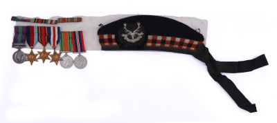 Collection of Medals, Badges, and Documents – British Soldier active in WWII and the Great Arab 