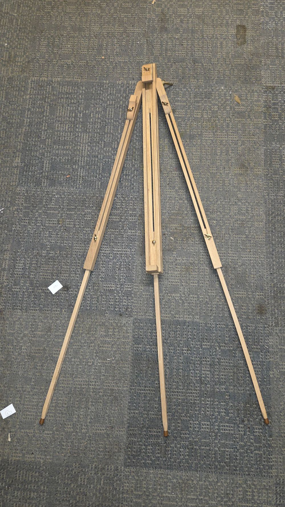 Lot 167 – Adjustable light-coloured wooden tripod artist’s easel stand