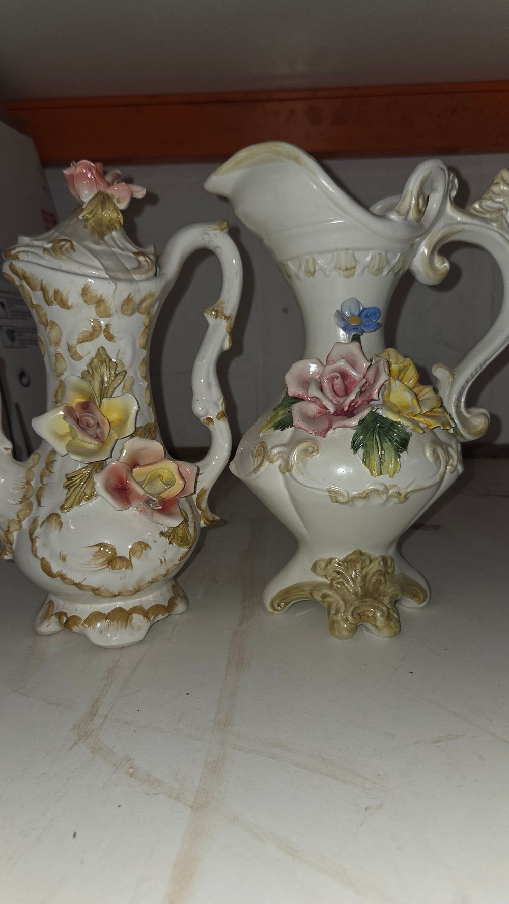 Lot 178 – A Pair of Ornate Ceramic Floral Pitchers