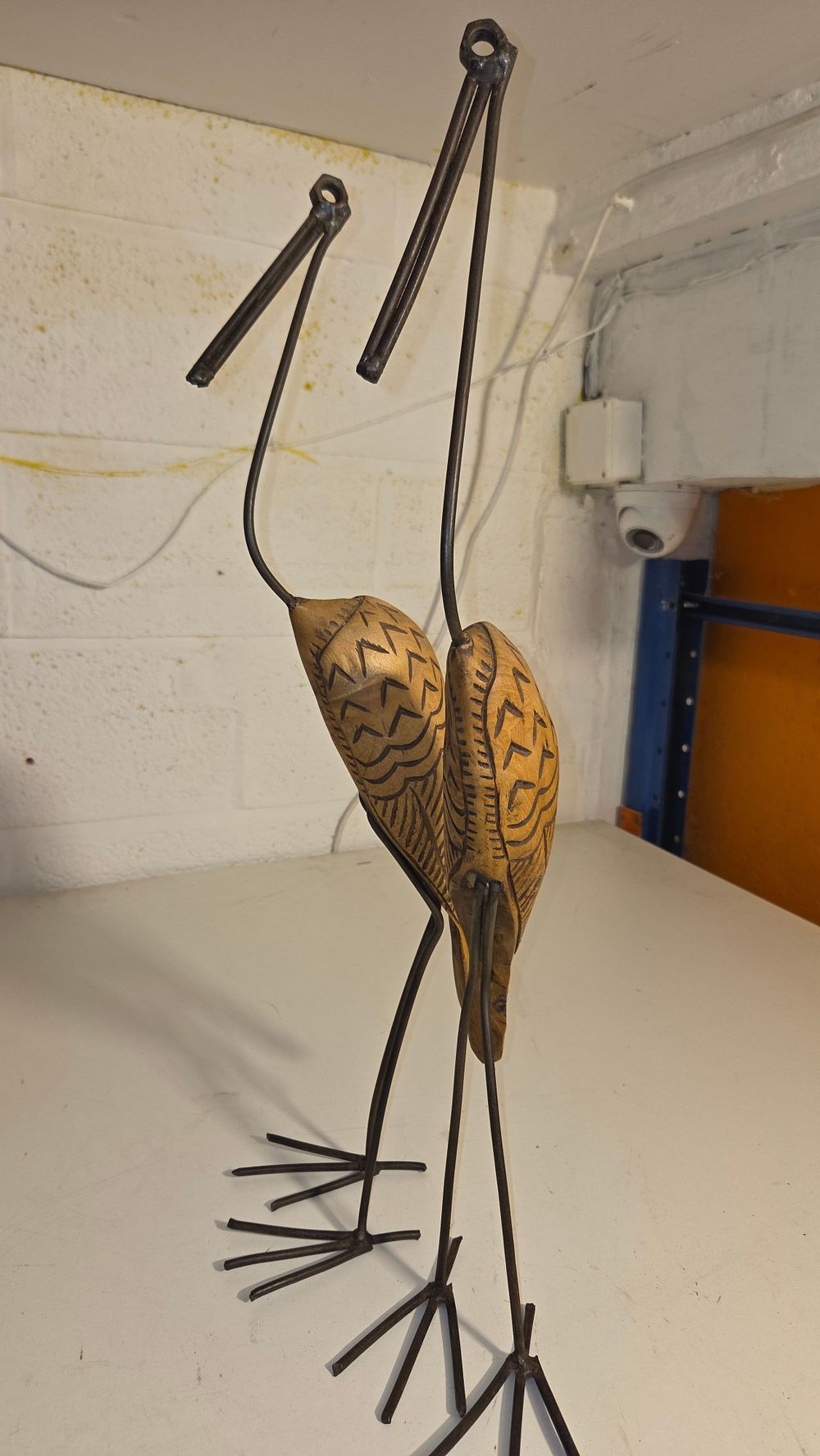 Lot 265 – A Pair of Carved Wood and Metal Bird Sculptures
