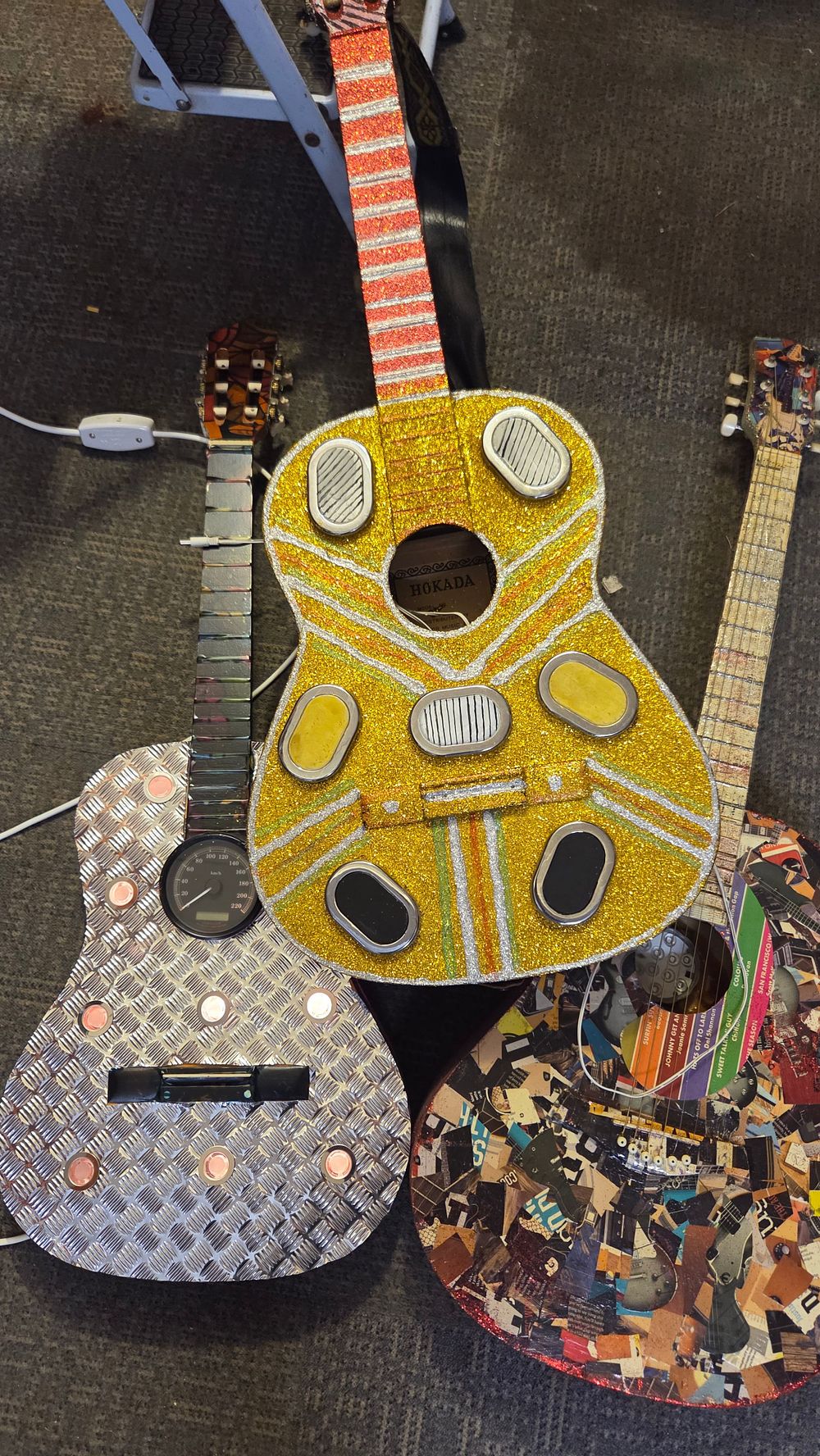Lot 270 – A Collection of Artistically Decorated Acoustic Guitars