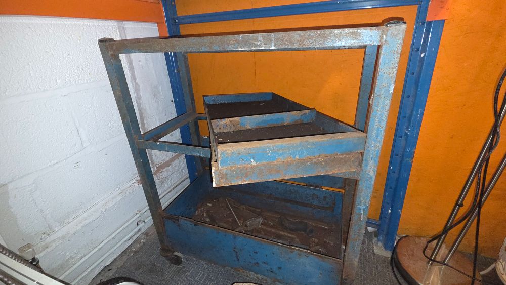 Lot 297 – Blue Metal Rolling Cart with a Collection of Tools