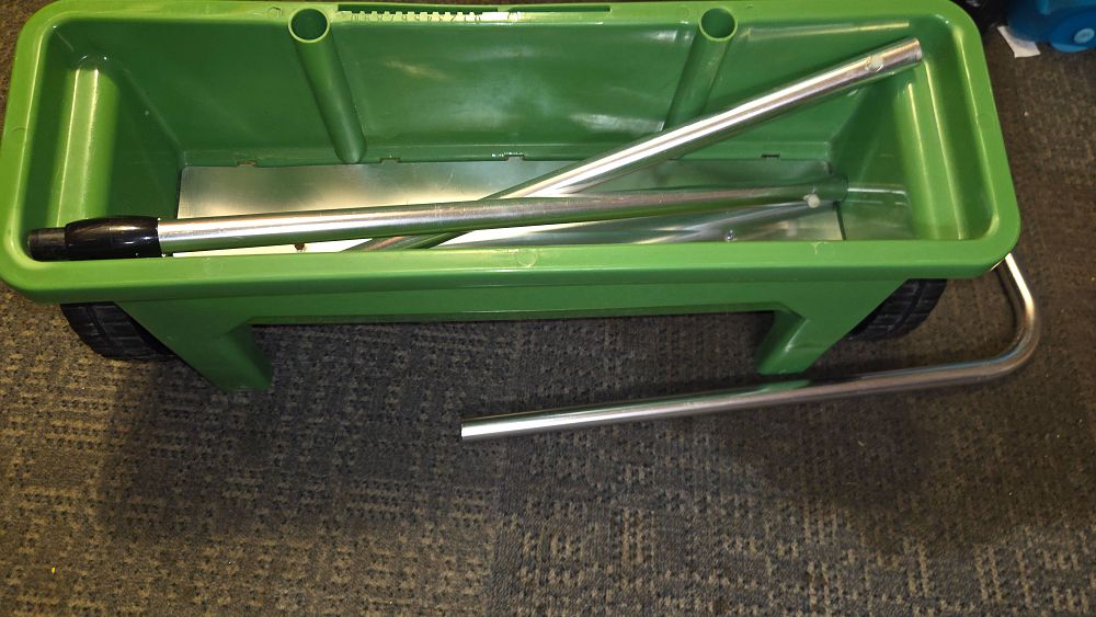 Lot 301 – New Green Plastic Drop Spreader with Metal Handle Components