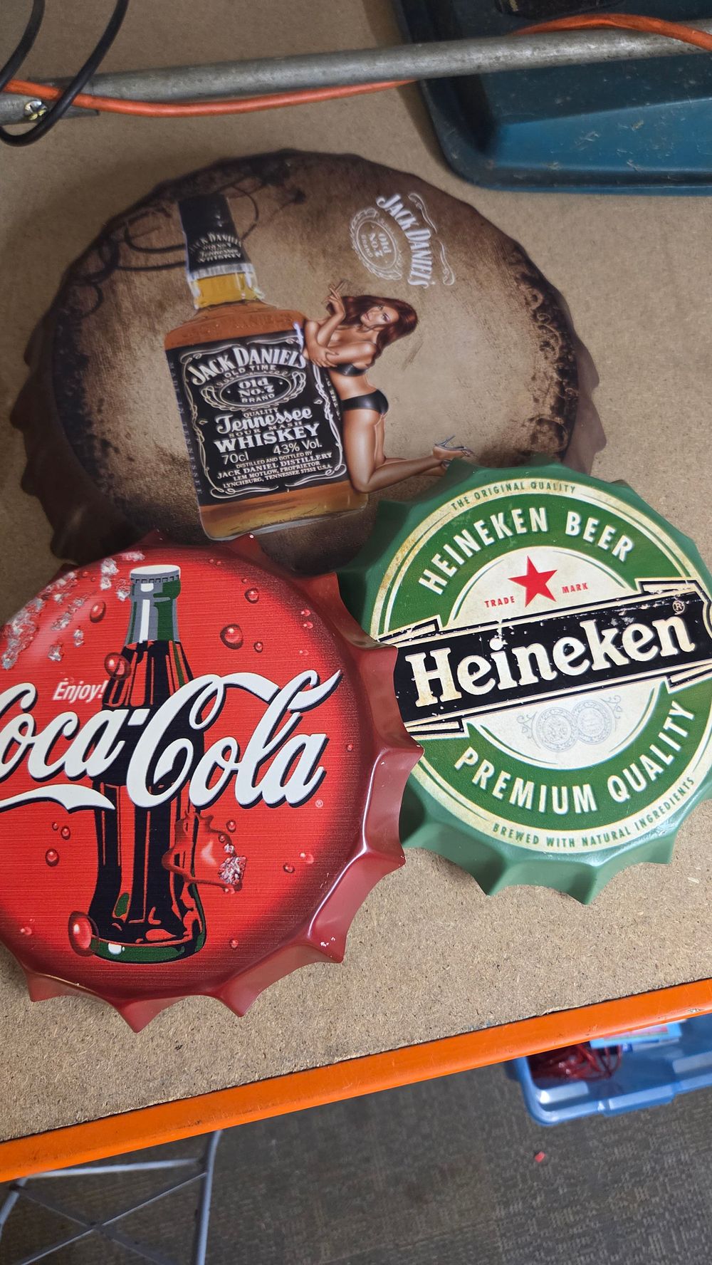 Lot 335 – A Trio of Oversized Metal Bottle Cap Wall Signs