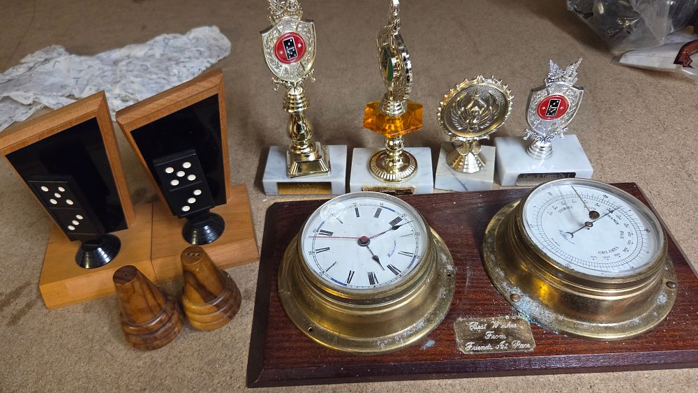 Lot 339 – A Collection of Domino Bookends, Trophies and Barometer