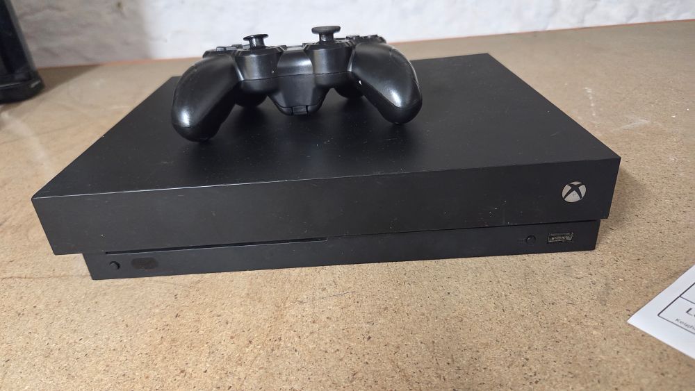 Lot 354 – Microsoft Xbox One X 1TB Console and Controller
