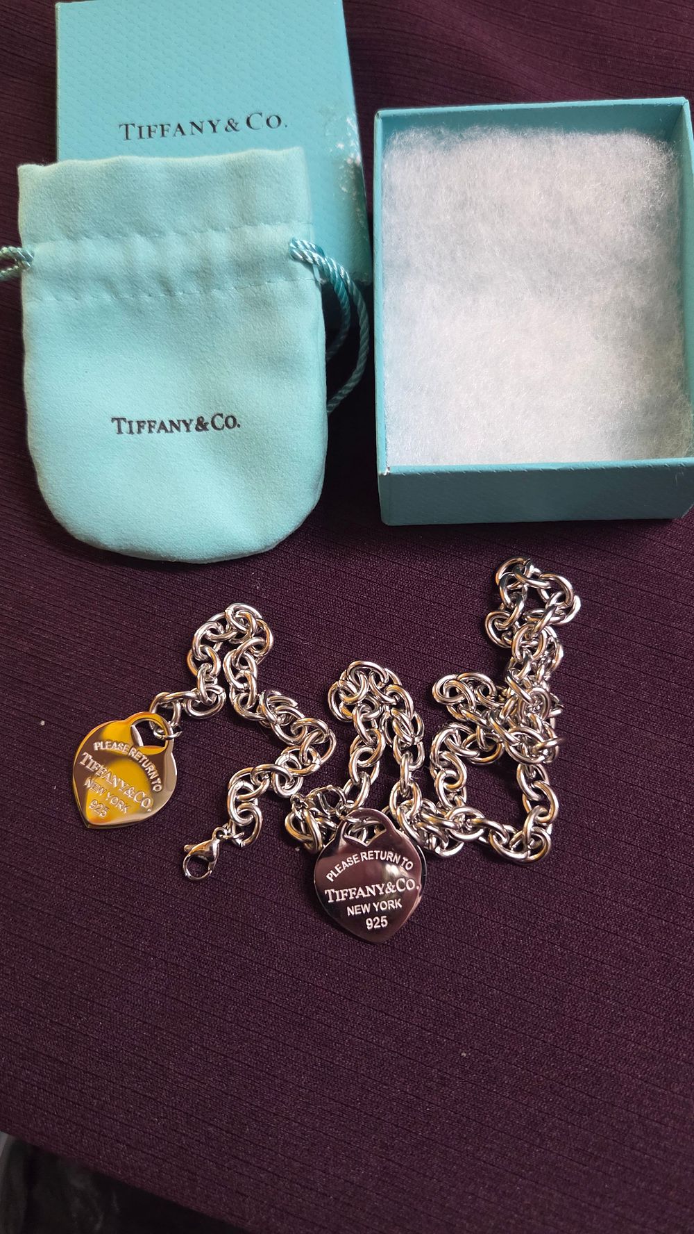 Lot 601 – A Pair of Silver Plated Tiffany Style Jewellery accompanied by a branded box and pouch.