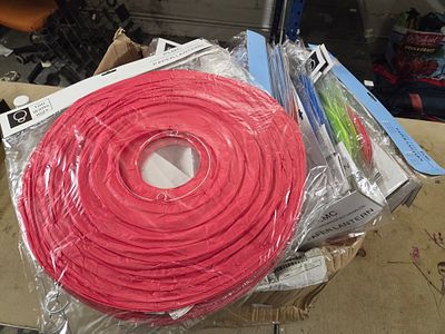 A Collection of PLMC Paper Lanterns in Various Colours. A collection of red, blue, and green 