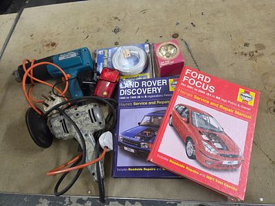 A Collection of Tools and Automotive Haynes Manuals