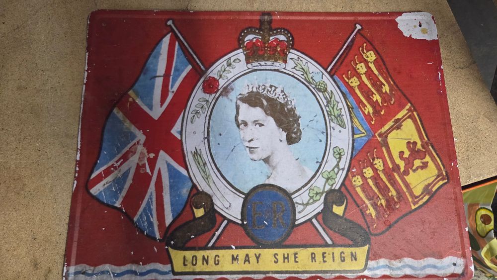Lot 180 – Queen Elizabeth II Commemorative Metal Advertising Sign