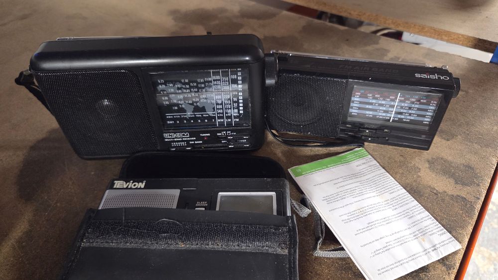 Lot 218 – A Trio of Uni-Com Saisho and Tevion Portable Radios