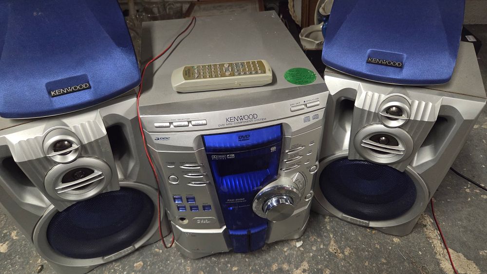 Lot 238 – Kenwood RXD-DV50 DVD Mini Component System with Multiple Speakers powers on