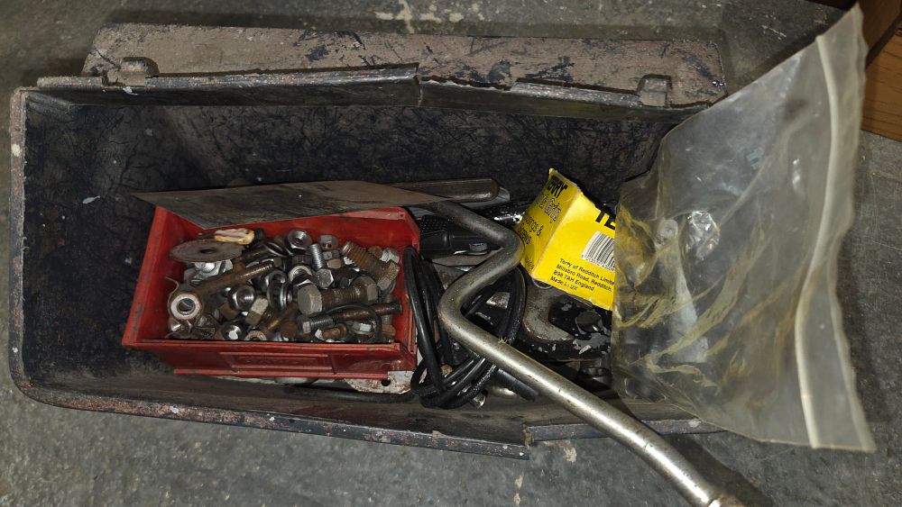 Lot 357 – A Collection of Tools and Hardware in a Metal Case