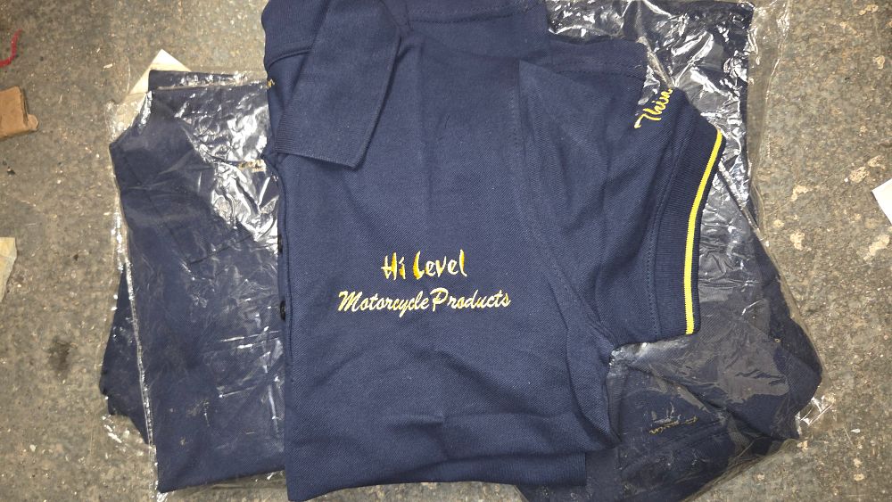 Lot 393 – Seven Hi Level Motorcycle Products Navy Blue Polo Shirts
