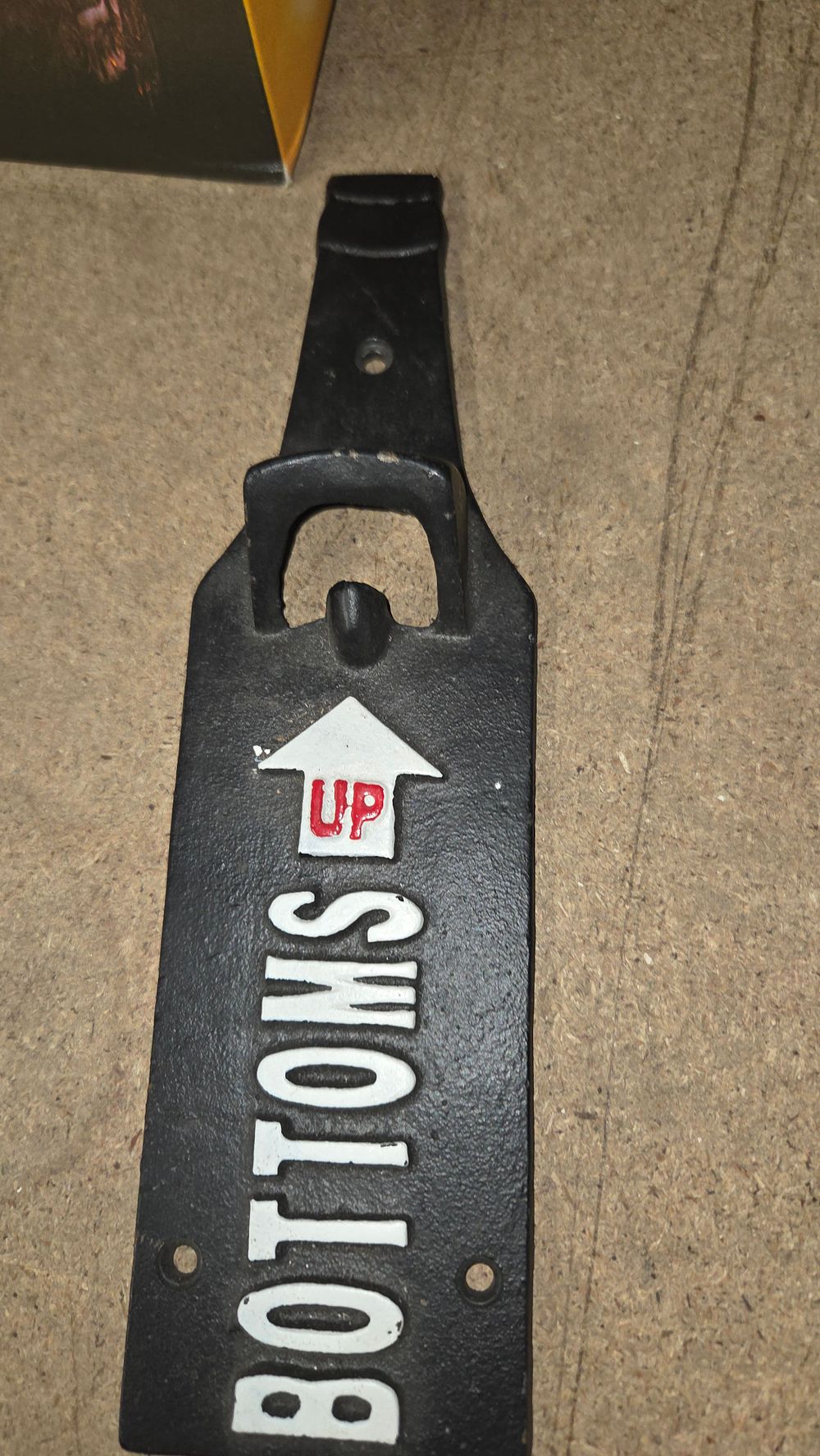 Lot 410 – Cast Iron Bottoms Up Wall Mounted Bottle Opener