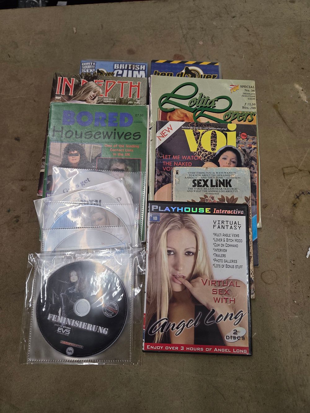 Lot 480 – A Collection of Multi-Coloured Adult-Themed Magazines and DVDs