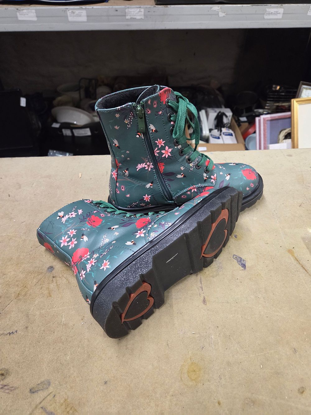 Lot 482 – A Pair of Dark Green Floral and Bee Pattern Boots