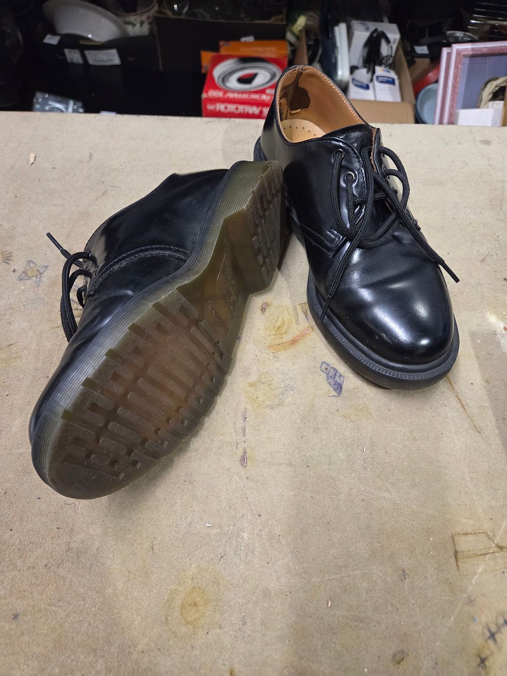 Lot 484 – A Pair of Black Dr. Martens Leather Oxford Shoes