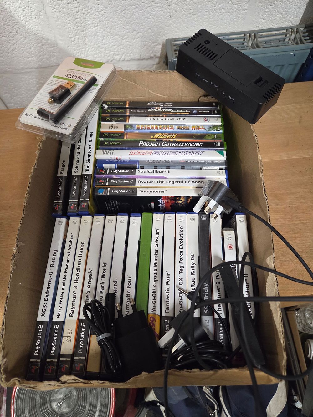 Lot 499 – A Collection of Video Games and Electronic Accessories