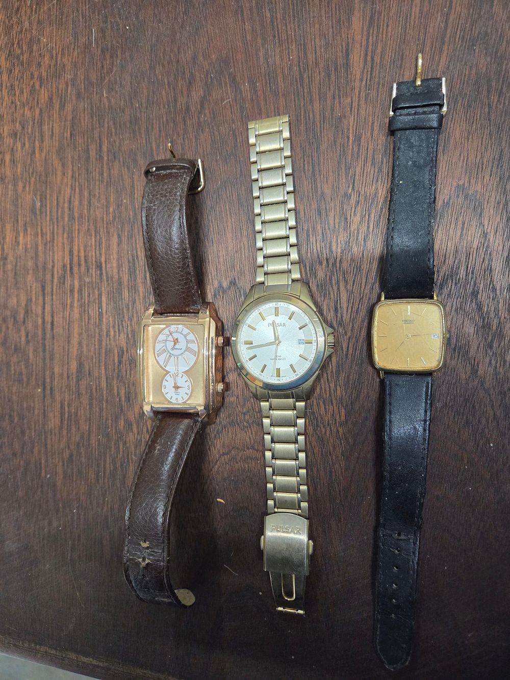 Lot 619 – A Trio of Gold Tone Seiko Pulsar and Geneva Wristwatches
