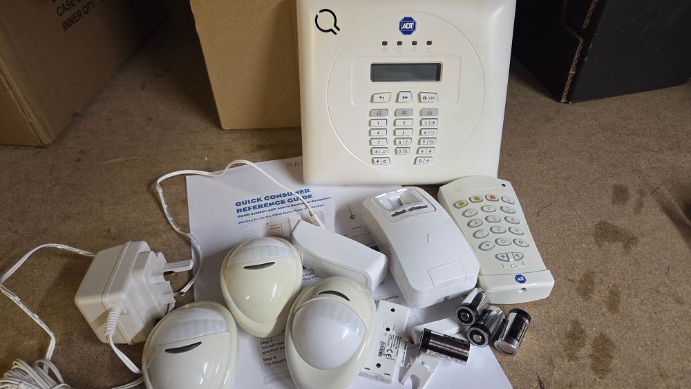 Lot 274 – A Collection of ADT Home Security System Components