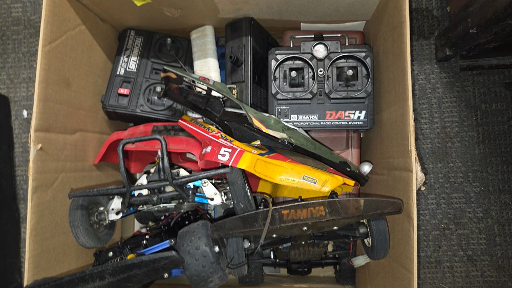 Lot 277 – Three Tamiya RC Car, Components and Transmitters