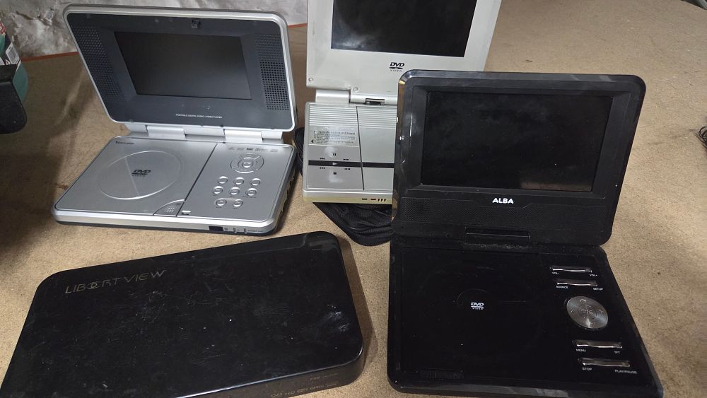Lot 321 – A Collection of Portable DVD Players and Electronic Devices